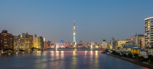 Naklejka na ściany i meble Tokyo river view with Tokyo sky tree in twilight time