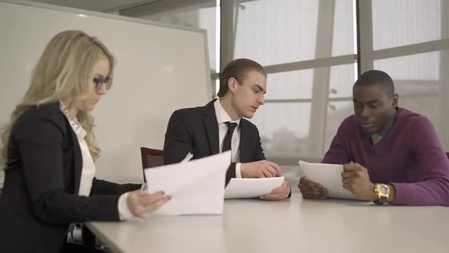 Group of attractive professionals involved in meeting