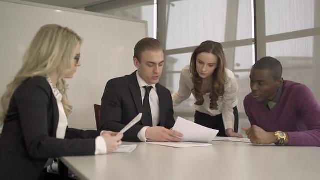 Group of attractive professionals involved in meeting