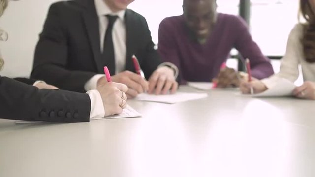 Group of attractive professionals involved in meeting