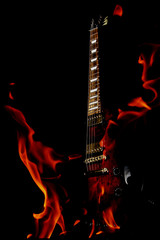 double exposure  electric guitar and fire