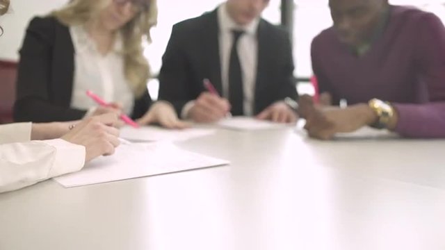 Group of attractive professionals involved in meeting
