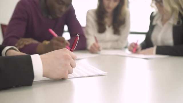 Group of attractive professionals involved in meeting