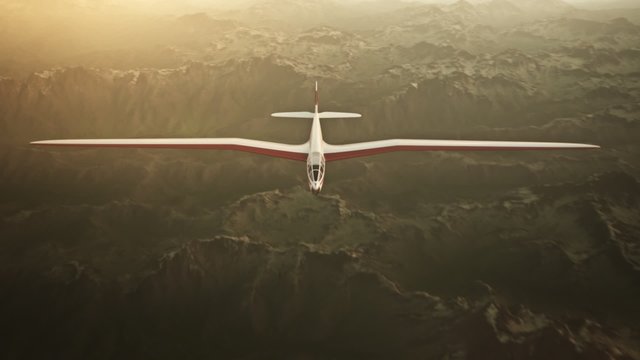 The white sailplane calmly gliding in the sky over the snow-covered mountains.