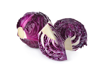 whole and cut fresh red cabbage on white background