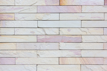 Modern stone brick wall background.
