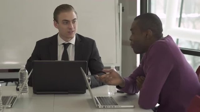 Group of attractive professionals involved in meeting