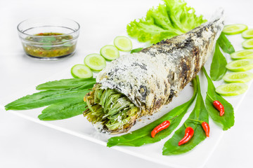 grill striped snakehead fish with salt coated