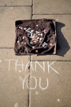Donated coins on the street