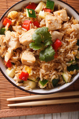 Tyahan with chicken and vegetables close up. vertical top view
