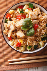 Japanese cuisine: Tyahan with chicken close up. vertical top view
