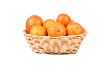 Fresh mandarins in a basket
