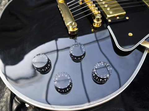 Fashion Electric Les Paul Guitar on Genuine Leather close-up 