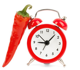 Red hot pepper with alarm clock