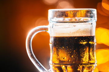 glass dark beer mug on a blurred background