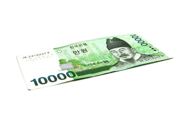 Obraz na płótnie Canvas Korean Won currency bills isolated on white background.