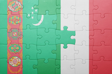 puzzle with the national flag of italy and turkmenistan