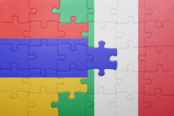 puzzle with the national flag of italy and armenia