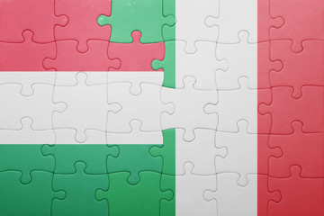 puzzle with the national flag of italy and hungary