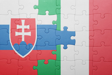 puzzle with the national flag of italy and slovakia