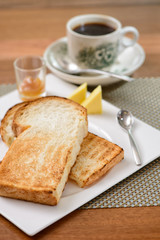 Oriental breakfast set in Malaysia consisting of coffee and toast bread