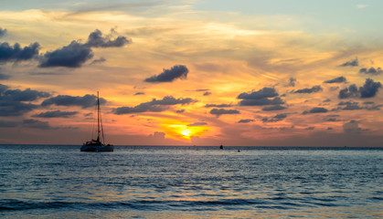 Fototapeta na wymiar sailboat and sunset at Layan beach, Phuket in Thailand