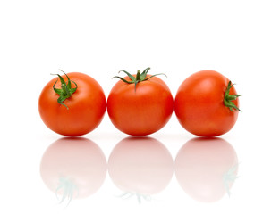 ripe cherry tomatoes on a white background
