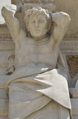 Sculpture of man on facade of the city Hall of Porto, Portugal