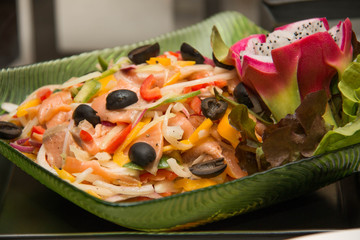  salmon mixed  salad in a bowl