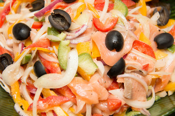 salmon mixed  salad in a bowl