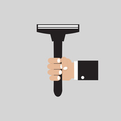 Hand Holding A Razor.