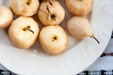 Pears and apples boiled in wine