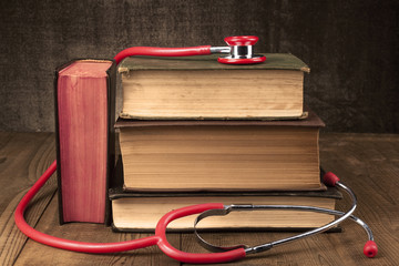 Red Stethoscope on Books