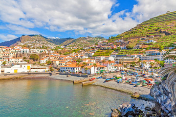 Fototapeta na wymiar Harbor of Camara de Lobos, Madeira with fishing boats
