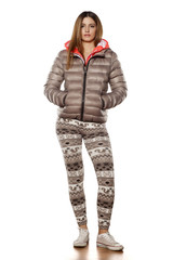 silhouette of a young woman in a jacket