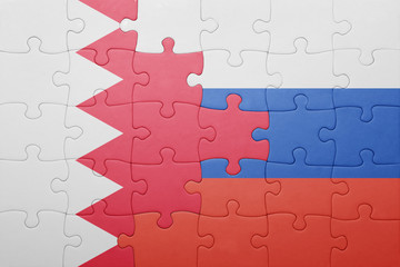 puzzle with the national flag of bahrain and russia