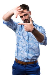 Fototapeta premium Handsome man focusing with his fingers