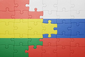 puzzle with the national flag of bolivia and russia