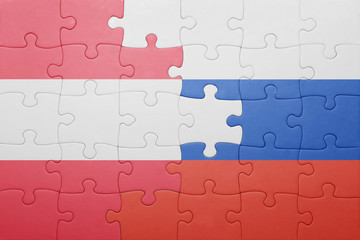 puzzle with the national flag of austria and russia