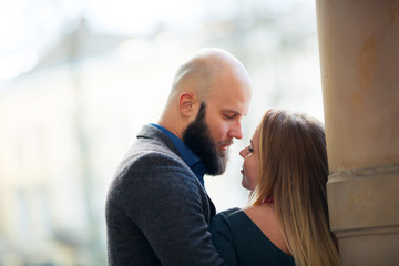summer holidays, love, travel, tourism, relationship and dating concept - romantic happy couple hugging in the street