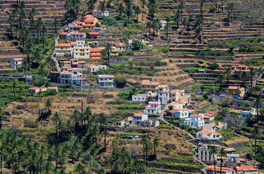 Coloful village on the slope of a ravine