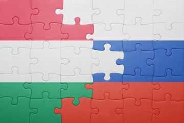 Fototapeta premium puzzle with the national flag of hungary and russia