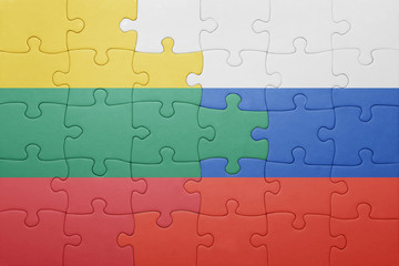 puzzle with the national flag of lithuania and russia