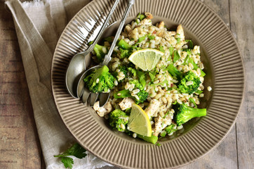 Warm salad from barley,broccoli and fried chicken.