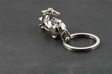 Motorbike keychain over black