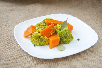 Pumpkin stew with broccoli and herbs.