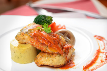 fish steak with vegetables are ready to server
