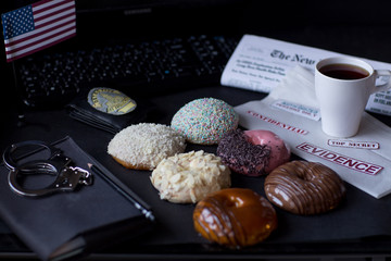 a set of donuts on the table detective