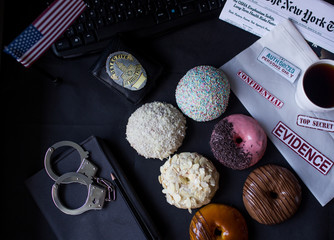 a set of donuts on the table detective