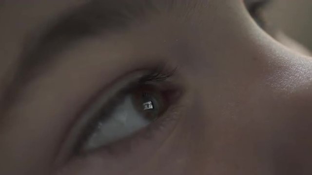 Views of a child engrossed in entertainment